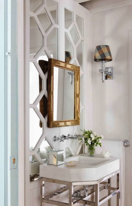 Mirrored Detail behind Bathroom Sink